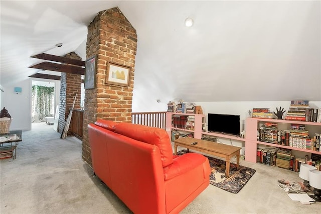 carpeted living room with vaulted ceiling