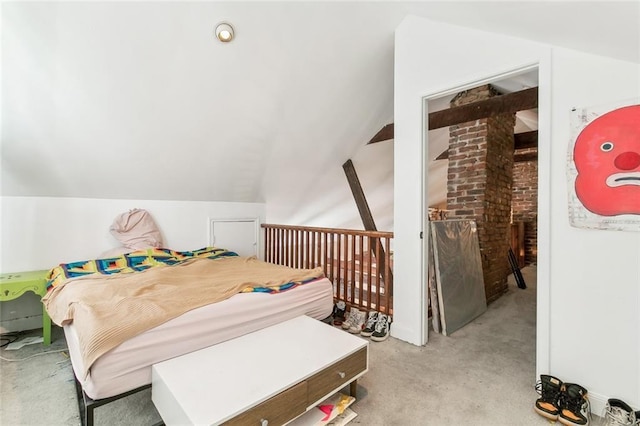 bedroom featuring lofted ceiling