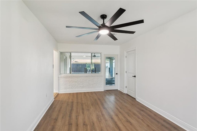 empty room featuring ceiling fan and wood-type flooring