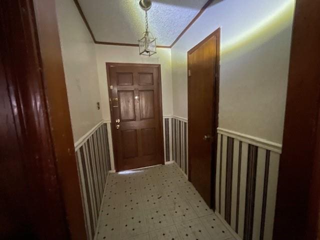 interior space with crown molding