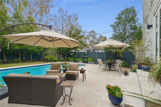 view of pool with an outdoor hangout area and a patio