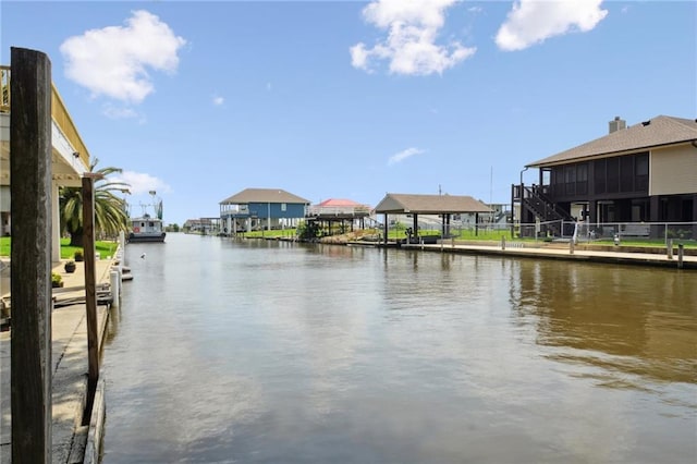 property view of water featuring a boat dock