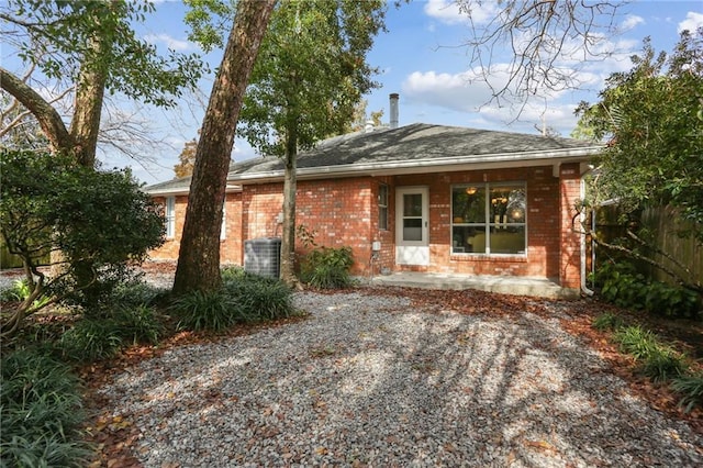 view of front of home featuring central air condition unit