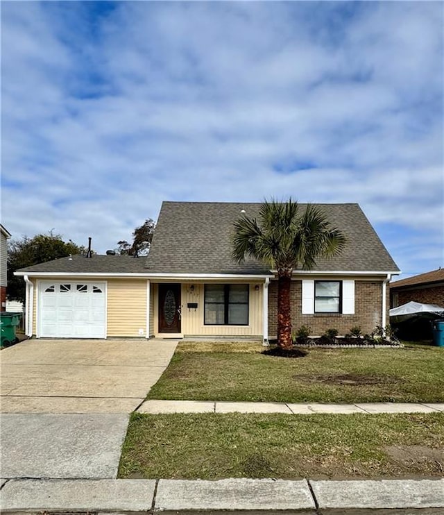 ranch-style house with a front lawn and a garage