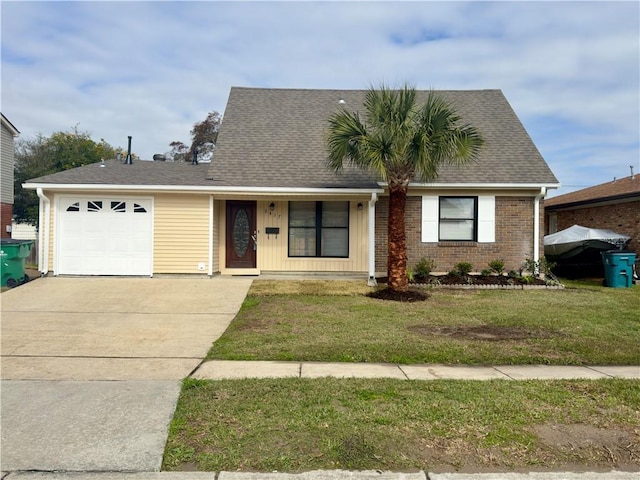 ranch-style house featuring a front lawn and a garage