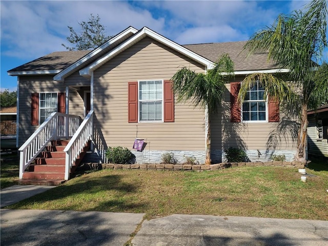 view of front facade with a front lawn