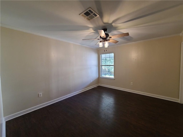 spare room with ceiling fan, dark hardwood / wood-style floors, and crown molding