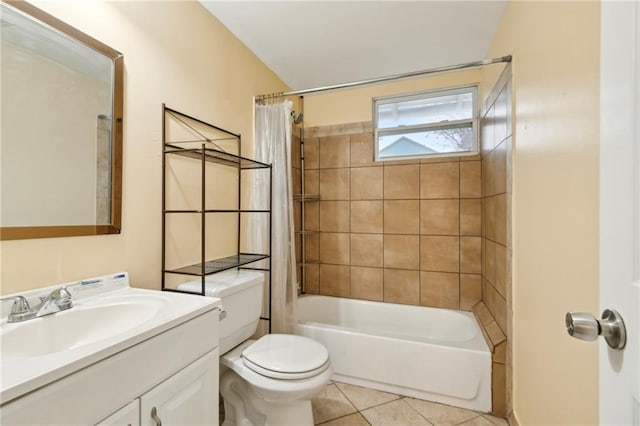 full bathroom with toilet, vanity, tile patterned floors, and shower / tub combo with curtain