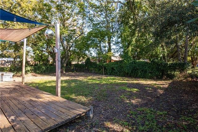 view of yard with a deck