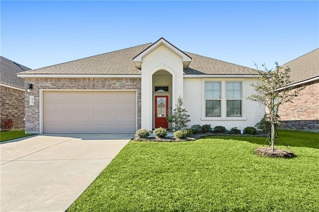 ranch-style home featuring a garage and a front lawn