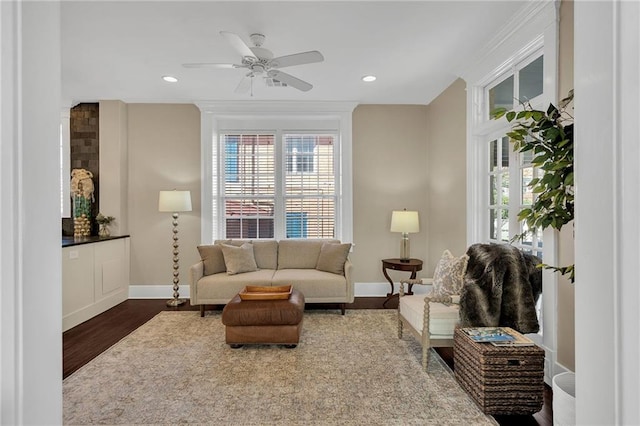 living room featuring baseboards, dark wood-style flooring, and recessed lighting