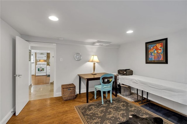 office space featuring recessed lighting, baseboards, and wood finished floors