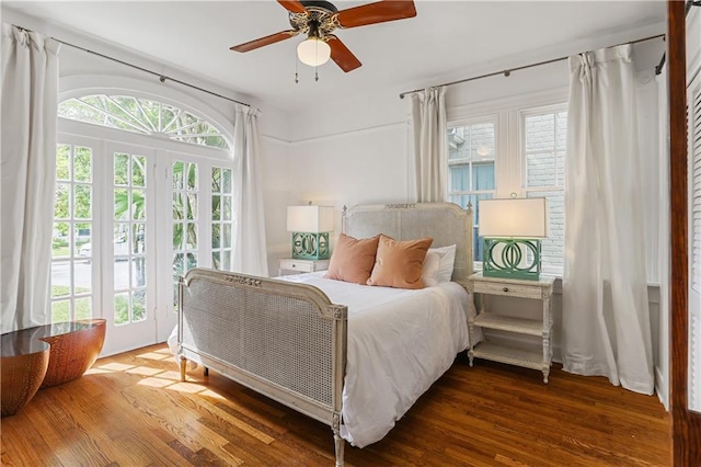 bedroom featuring hardwood / wood-style flooring and ceiling fan