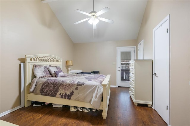 bedroom with dark hardwood / wood-style floors, ceiling fan, and lofted ceiling