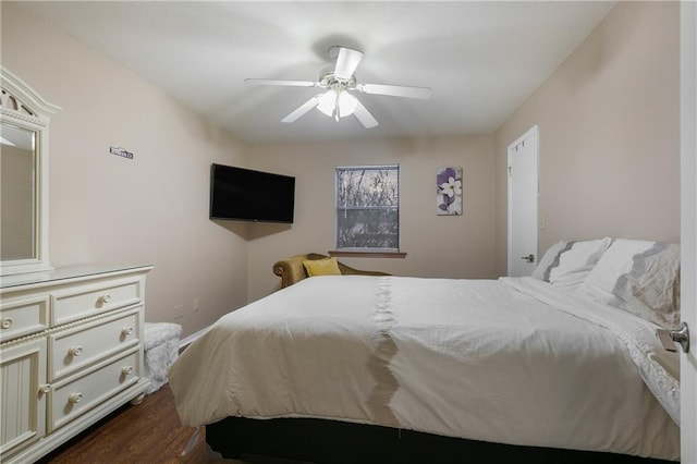 bedroom featuring ceiling fan and dark wood-type flooring