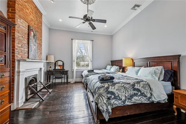 bedroom with ceiling fan, ornamental molding, and dark wood-type flooring