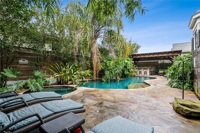 view of pool featuring a patio area and a pergola