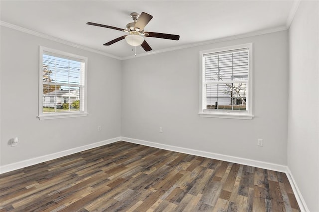 spare room with ceiling fan, dark wood-type flooring, crown molding, and plenty of natural light