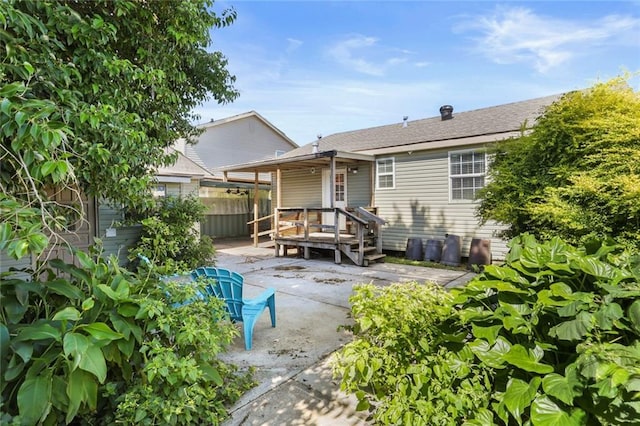 rear view of house with a patio