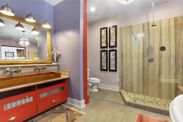 bathroom with vanity, a shower, a bidet, toilet, and a chandelier