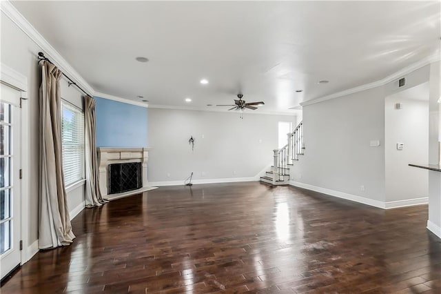 unfurnished living room with crown molding, ceiling fan, and dark hardwood / wood-style floors