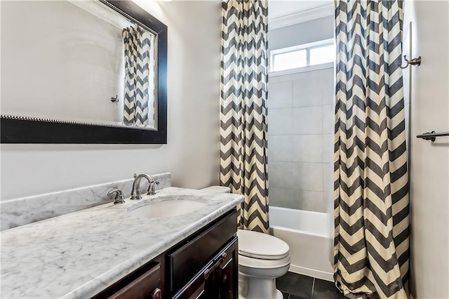 full bathroom with tiled shower / bath combo, tile patterned floors, toilet, vanity, and ornamental molding