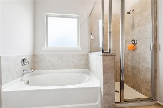 bathroom with independent shower and bath