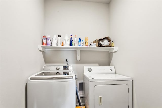 laundry room with washer and clothes dryer