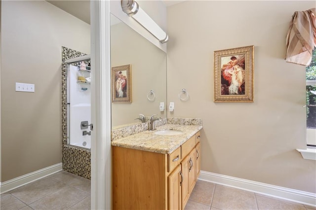 bathroom with tile patterned flooring, vanity, and tiled shower / bath combo