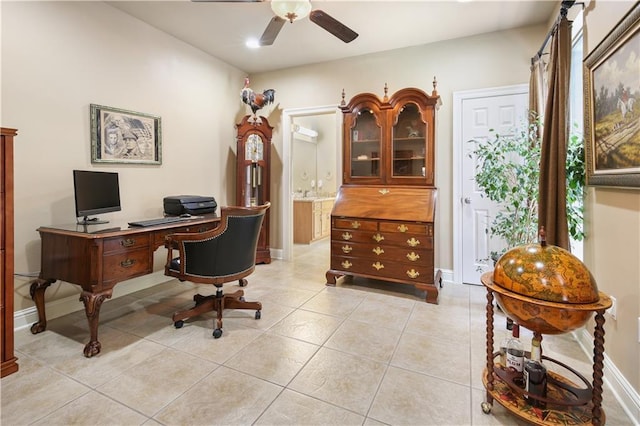 office area featuring ceiling fan and light tile patterned flooring