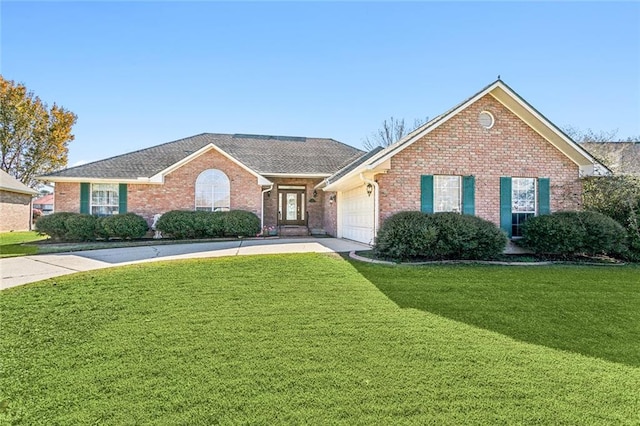 single story home with a front lawn and a garage