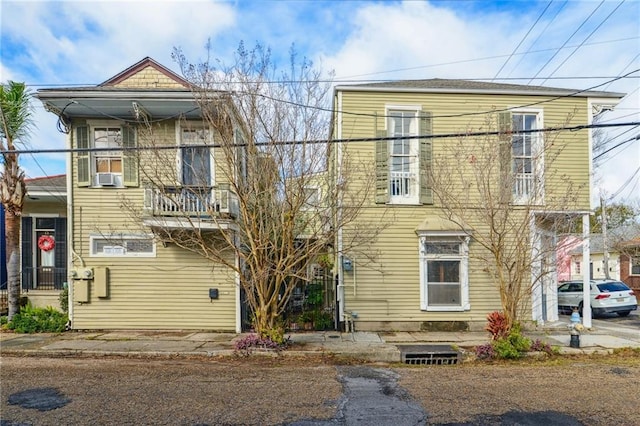 view of front of home with cooling unit