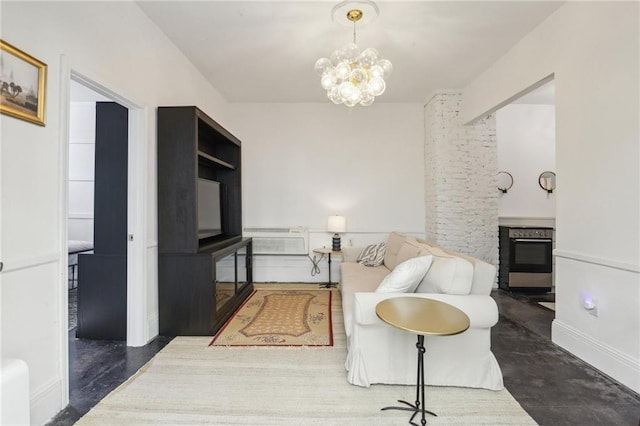 living room with a wall mounted AC and a chandelier