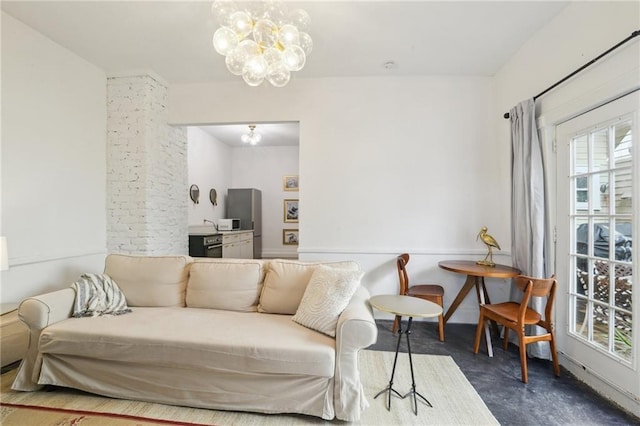 living room featuring a chandelier