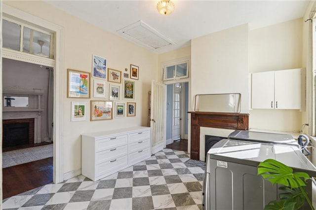 interior space featuring cabinets and independent washer and dryer