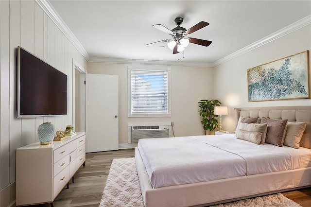 bedroom with ceiling fan, light hardwood / wood-style flooring, crown molding, and a wall unit AC