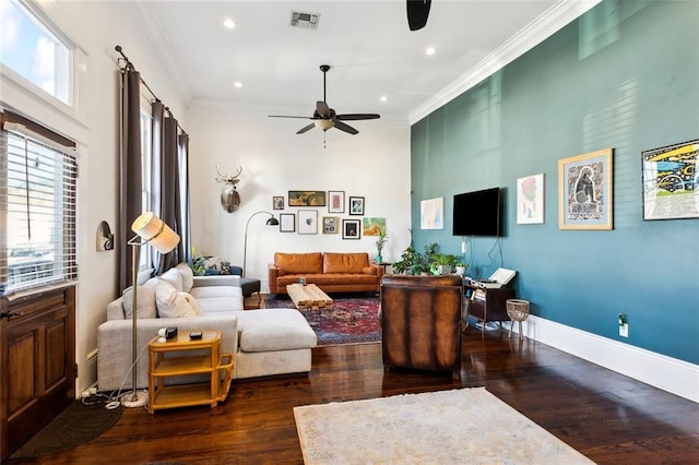 living room featuring crown molding, ceiling fan, and dark hardwood / wood-style flooring