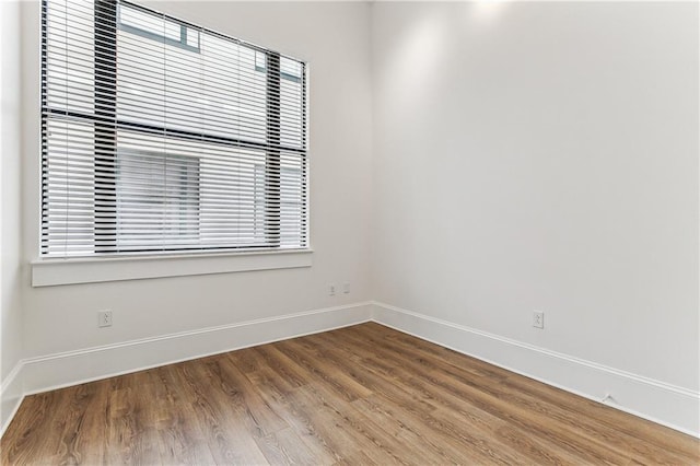 empty room featuring hardwood / wood-style floors