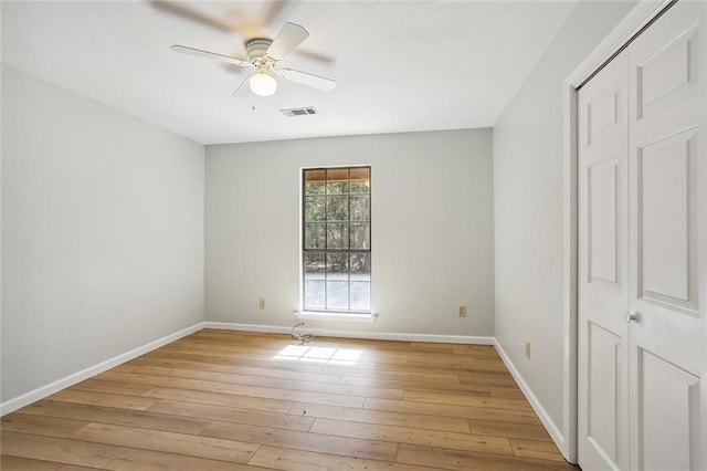 unfurnished bedroom with light hardwood / wood-style flooring and ceiling fan