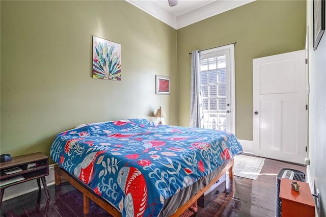 bedroom featuring hardwood / wood-style floors and ceiling fan