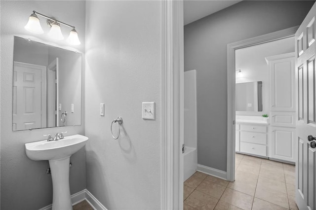 bathroom featuring tile patterned floors and sink