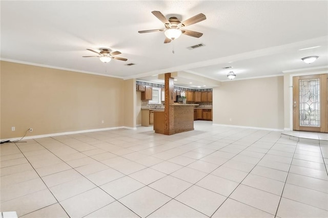 unfurnished living room with ceiling fan, light tile patterned flooring, and crown molding