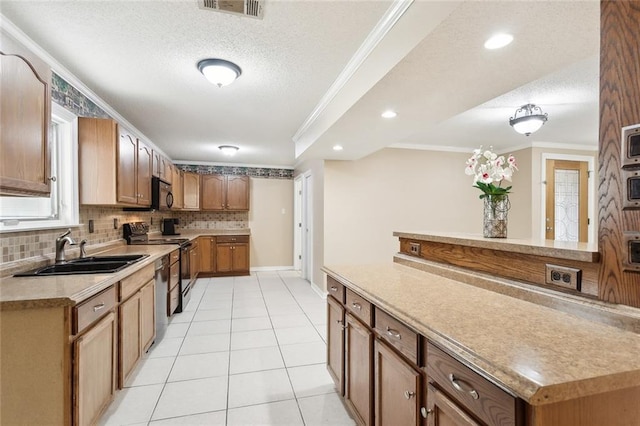 kitchen featuring black appliances, crown molding, sink, a textured ceiling, and light tile patterned flooring