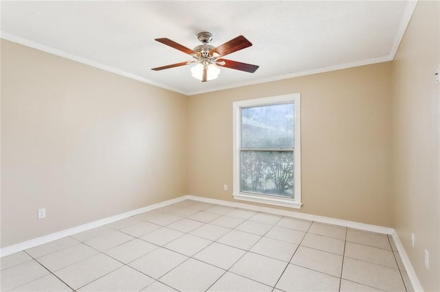 spare room with light tile patterned floors, ceiling fan, and crown molding