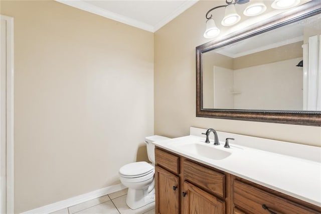 bathroom featuring tile patterned floors, vanity, toilet, and crown molding