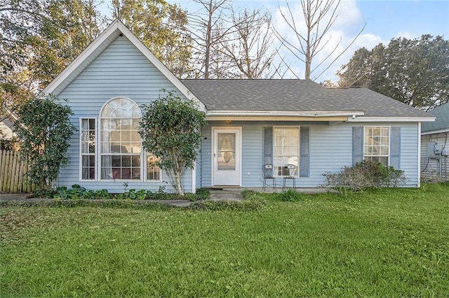 single story home with a front yard