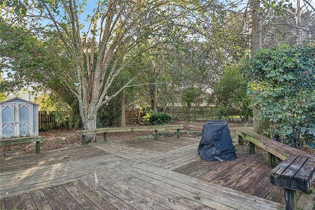 wooden deck with a storage unit