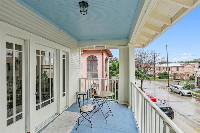 balcony featuring a porch