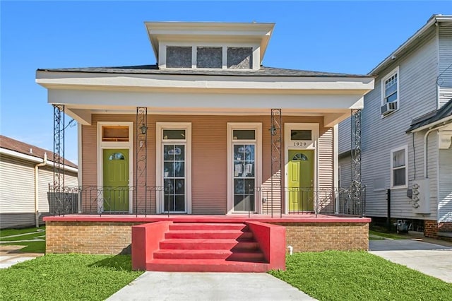 view of front facade featuring covered porch