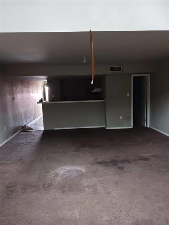 7112 Barrington Ct, New Orleans, LA 70128 - unfurnished living room with baseboards
